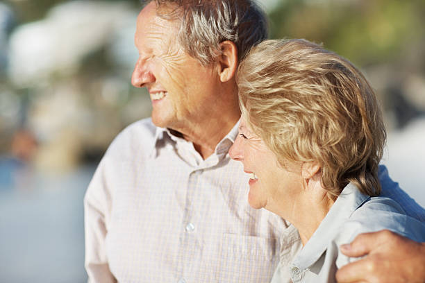 istock Happy elderly couple looking away at something interesting 182736683