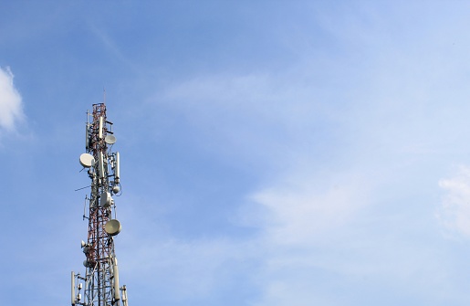 Signal transmitting tower against blue sky