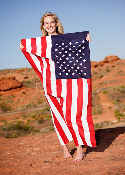 istock Pretty Young Woman with American Flag 182738411