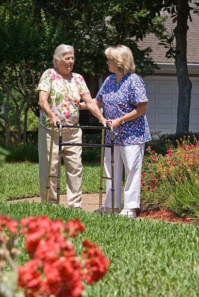 istock Senior woman and nurse 182738668