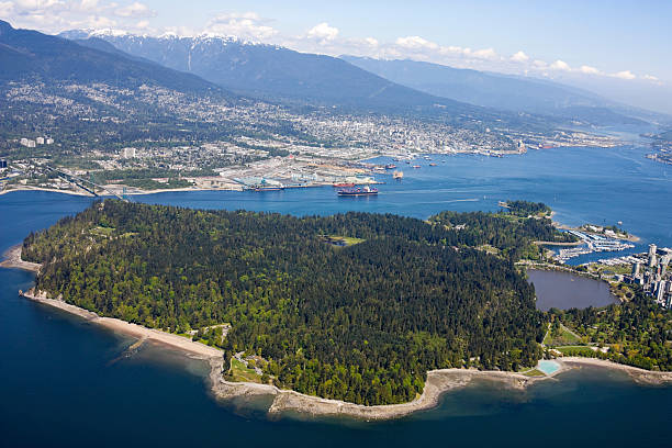 Stanley Park Aerial view of Vancouver's famous Stanley Park beach english bay vancouver skyline stock pictures, royalty-free photos & images