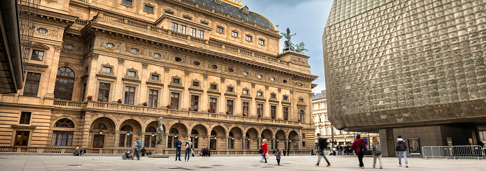 Prague, Czechia - September 15, 2022: People walk by the Prague National Theatre on the streets of Old Town Czech Republic Czechia