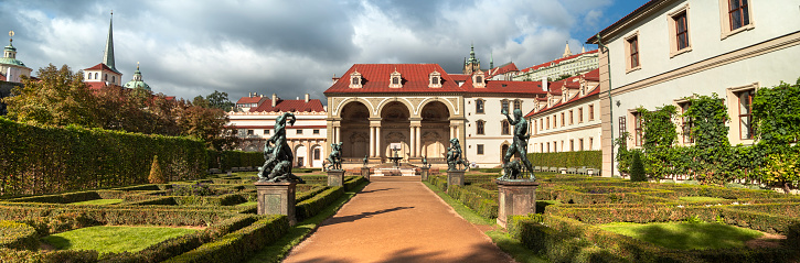 Prague, Czechia - September 18, 2022:  Grounds and formal gardens with ornate statues of the Baroque Waldstein or Wallenstein Palace in Prague Czechia