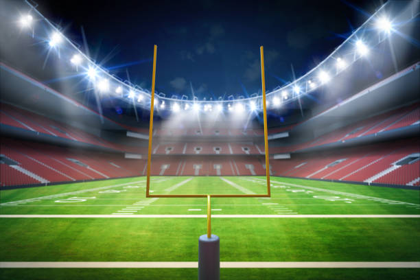 American football field in stadium 3d rendering american football field with goalpost in stadium football field night american culture empty stock pictures, royalty-free photos & images