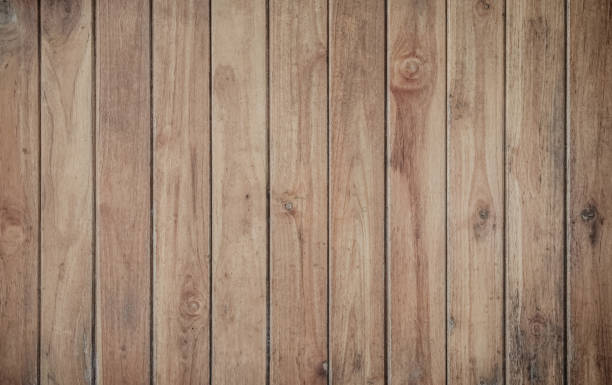 istock Wood plank brown texture background surface with old natural pattern. Barn wooden wall antique cracking furniture weathered rustic vintage peeling wallpaper. Summer organic decoration with hardwood. 1827406960