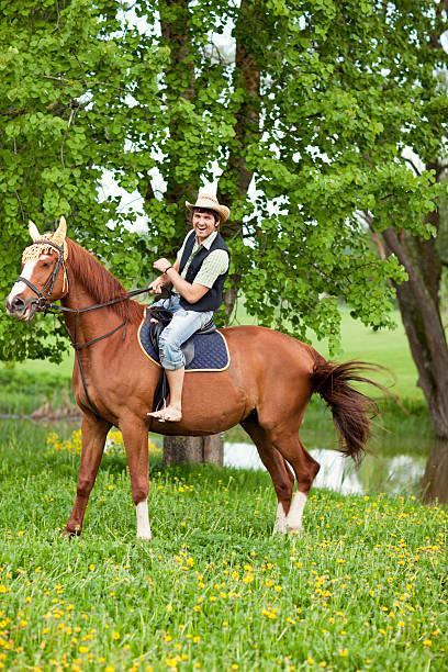 istock Stable-boy on his horse 182740714