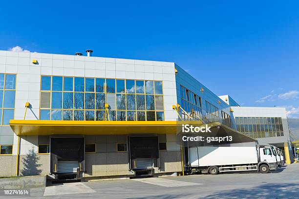Closeup Of A Modern Distribution Center Building Stock Photo - Download Image Now - Airplane Hangar, Distribution Warehouse, Freight Transportation