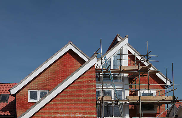 istock Building work on new houses - construction site 182741754