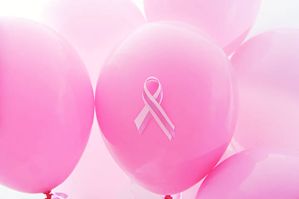 Pink Baloons with a pink breastfeeding awareness ribbon.