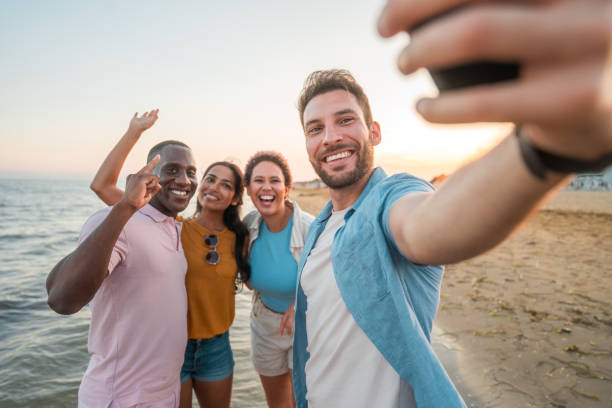 istock Coastal Friendship, Multiracial People Taking A Selfie 1827424162