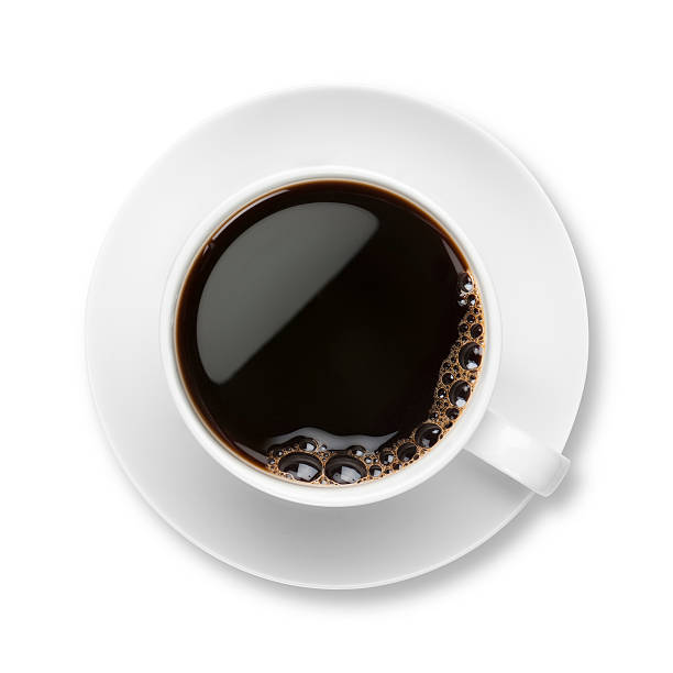 café noir avec des bulles en blanc tasse avec soucoupe - coffee cup black coffee isolated photos et images de collection
