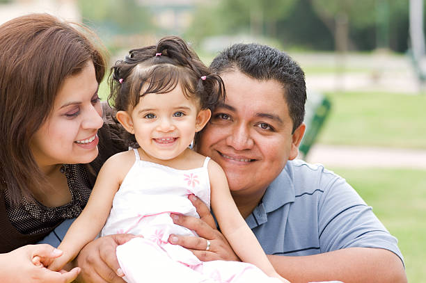 istock Cheerful Hispanic Family at the Park 182743137