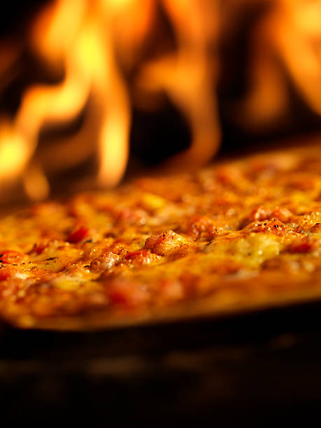 istock Pizza in a Wood Burning oven 182743635