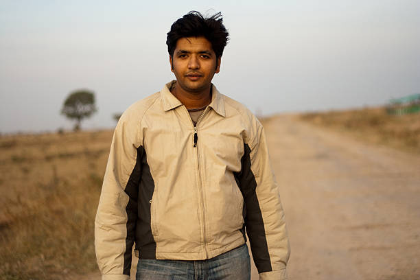 istock Smart Indian Youth in Rural Area 182743667