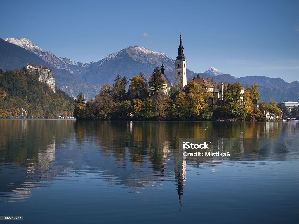 Lake Bled View of Lake Bled located in Slovenia Europe. There is St. Mary&#180;s Church of the Assumptionon on the Island and ancient castle on top of a rock. Autumn Stock Photo