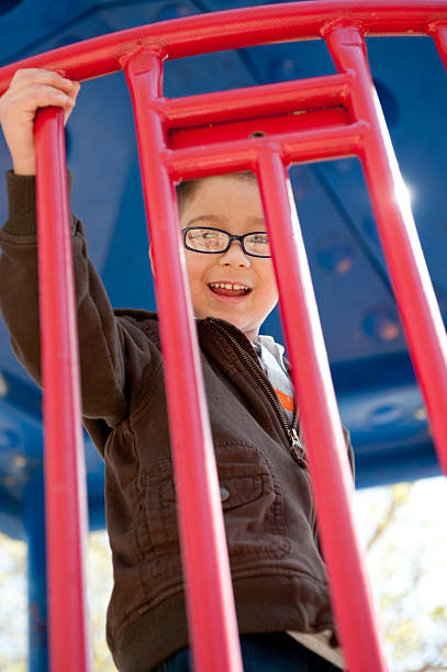 istock cute boy at the playground 182743932