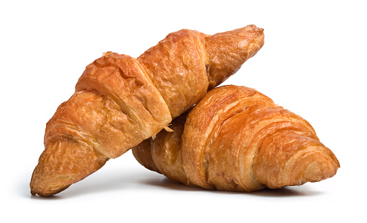 Fresh croissants on white. 