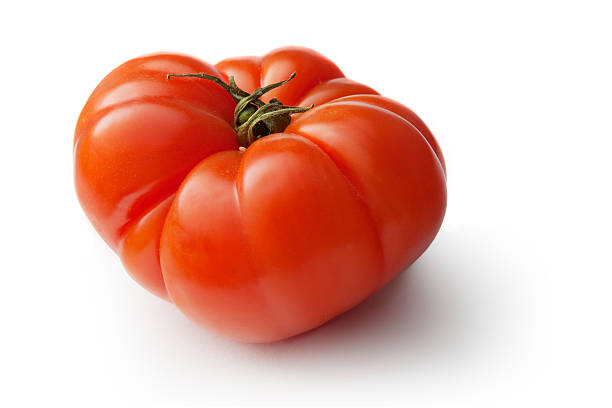 legumes: tomate heirloom - tomato heirloom tomato vegetable isolated - fotografias e filmes do acervo