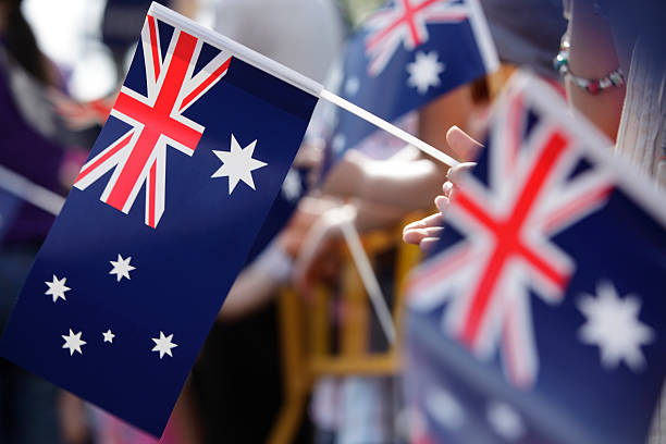 australische flagge märz - australia australia day celebration flag stock-fotos und bilder