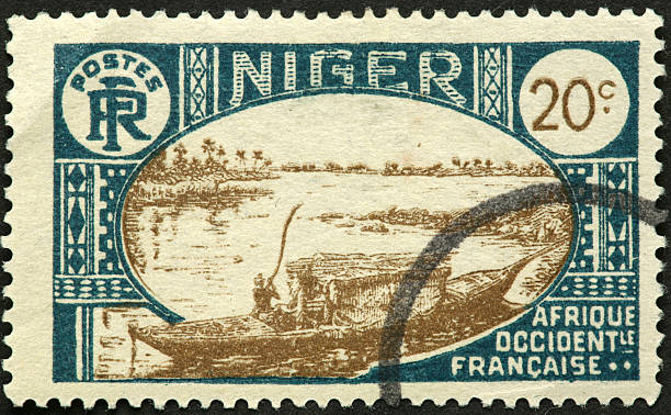 istock old African riverboat on a Niger stamp 182745788