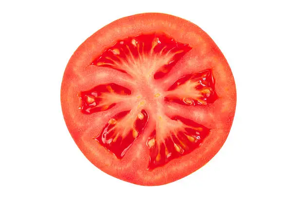 Fresh and ripe juicy tomato slice on white background