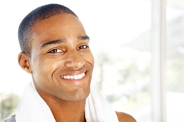 istock Cute African American guy with a towel around neck 182746286