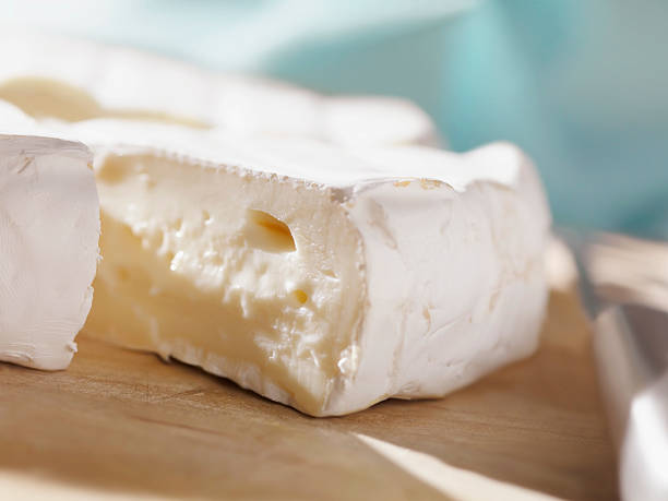 Brie Cheese Brie Cheese -Photographed on Hasselblad H3D2-39mb Camera brie stock pictures, royalty-free photos & images