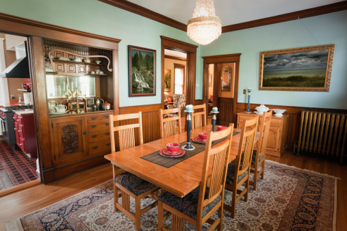 Subject: The interior dining room of a restored and renovated Victorian style home.