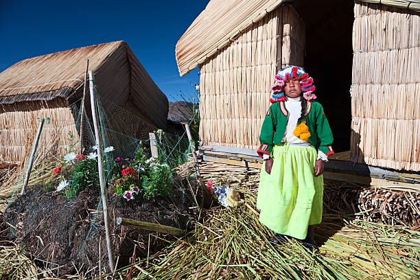 istock Uros child on floating island 182746443