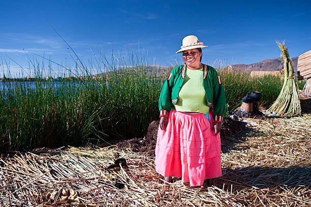 istock Uros woman on floating island 182746984