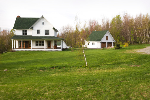 Beautiful farmhouse in a pastoral environment.  Outdoors photography. Concepts: architecture; nature; landscape.
