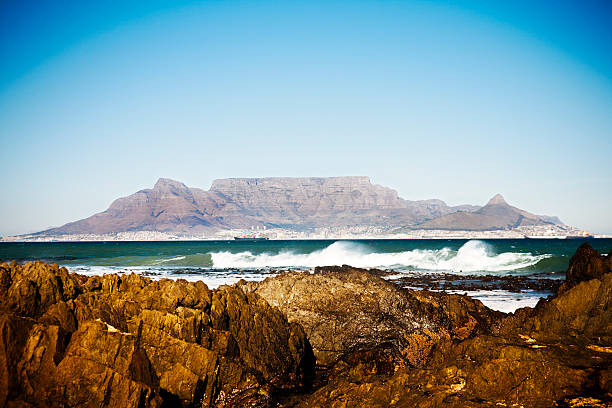 istock Table Mountain's iconic shape seen from across the bay 182747332
