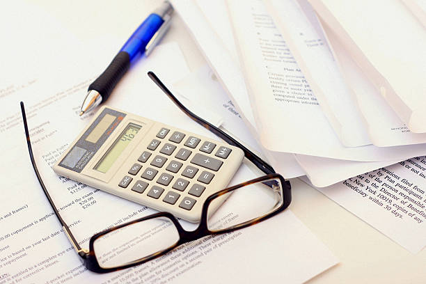 istock Insurance Claim Forms and Paperwork - Stock Photo 182747653