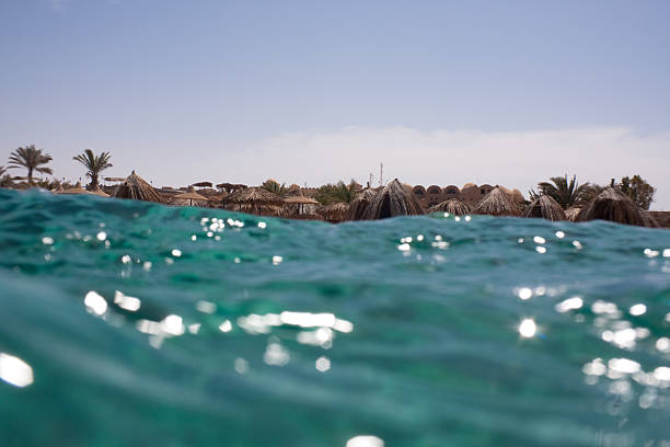 Hoilday resort seen from the sea full of waves