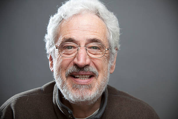 istock Senior Man with Glasses Looking at the Camera 182748779
