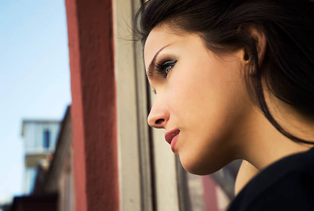 istock Beauty looking out from the window 182748820