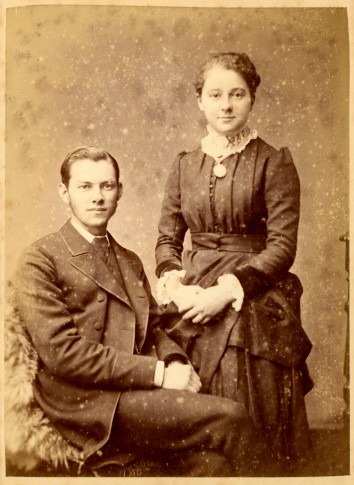 Vintage photograph of a young man and woman from the Victorian era circa 1880.