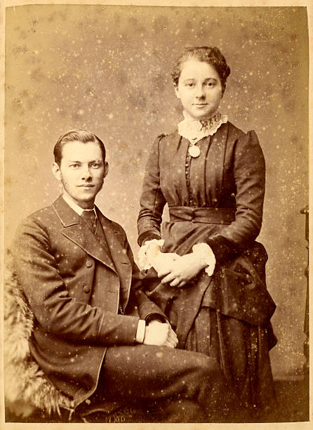 Victorian Young Couple Vintage Photograph Vintage photograph of a young man and woman from the Victorian era circa 1880. 19th century style photos stock pictures, royalty-free photos & images