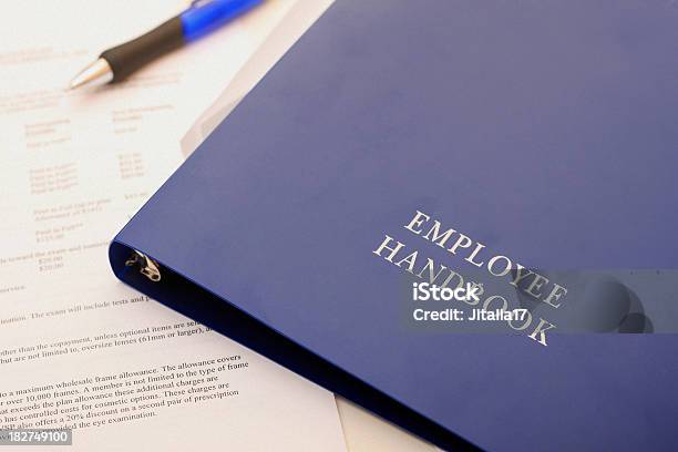 Employee Handbook And Forms Stock Photo - Download Image Now - Handbook, Human Resources, Benefits