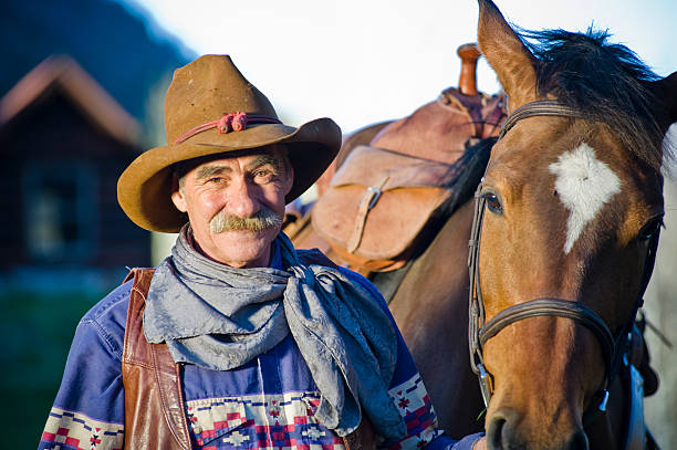 istock Old cowboy with Horse 182749136