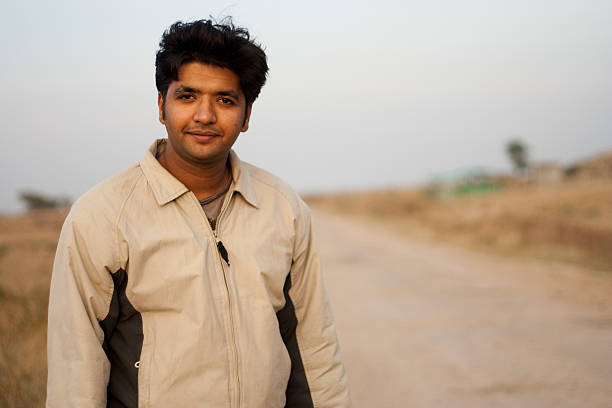 istock Smart Indian Youth in Rural Area 182749324