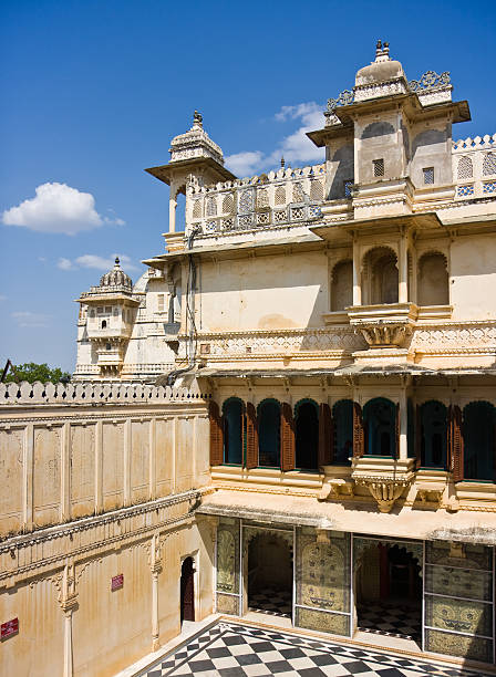 Udaipur City Palace balconies and black and white court / Udaipur India