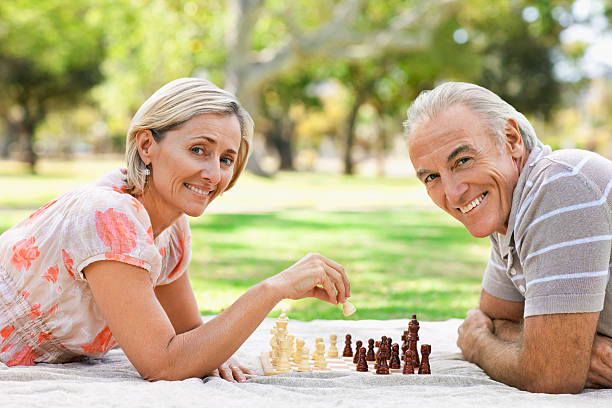 istock Senior Couple Playing Chess 182750004