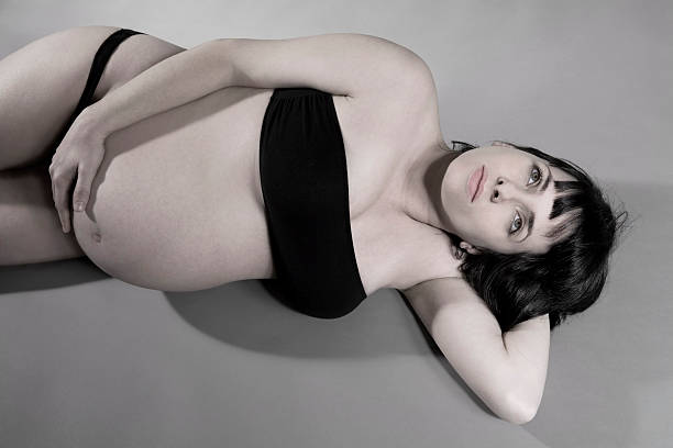 妊娠女性 - human pregnancy flash ストックフォトと画像
