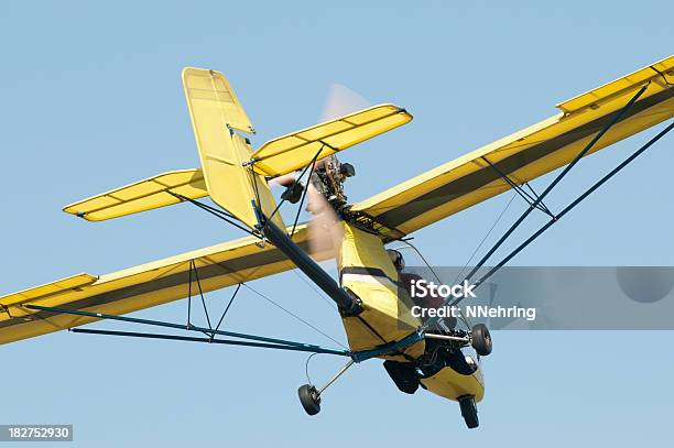 Ultralight Airplane Quicksilver Gt400s Flying In Blue Sky Stock Photo - Download Image Now