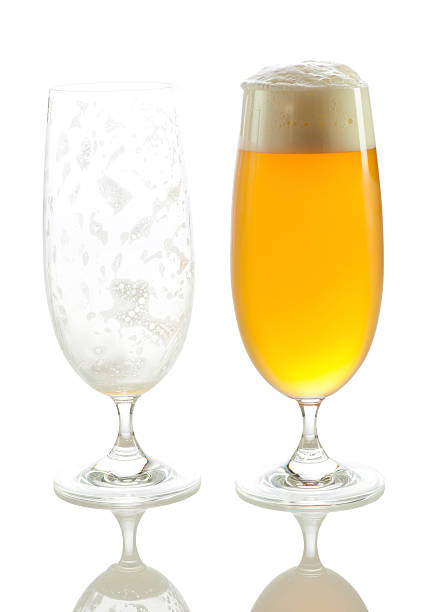 istock Empty and full glass of beer 182753118