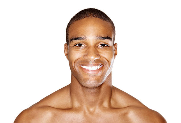 istock Smart shirtless man smiling isolated against white 182754078