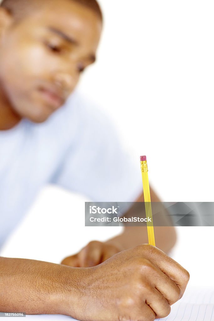 Jovem college guy escrever para baixo notas, foco na Mão - Royalty-free 20-29 Anos Foto de stock