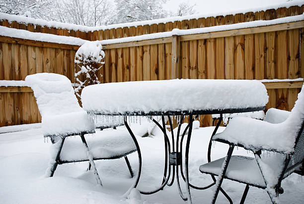 istock Snow on patio furniture 182755197