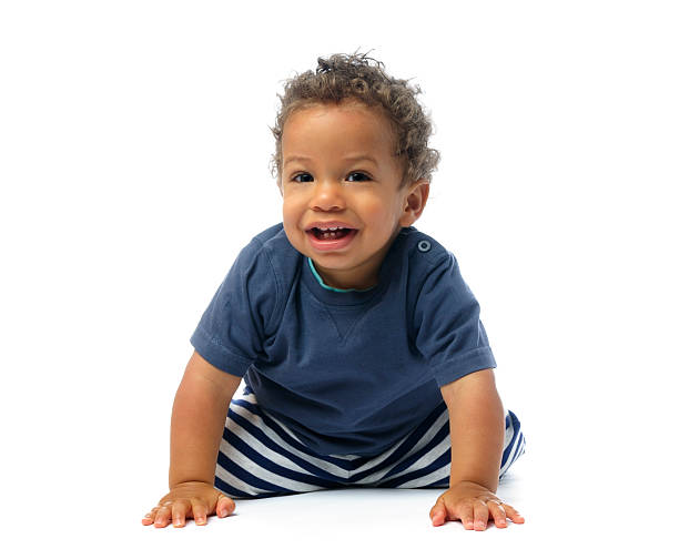 istock Baby Smiling While Crawling And Looking at The Camera 182756266